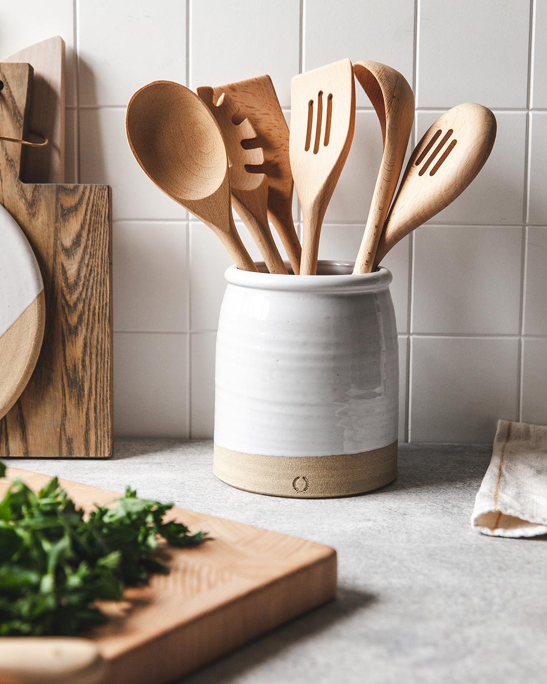 Farmhouse Pottery essential kitchen utensil set of 6 in beech shown in beehive crock.
