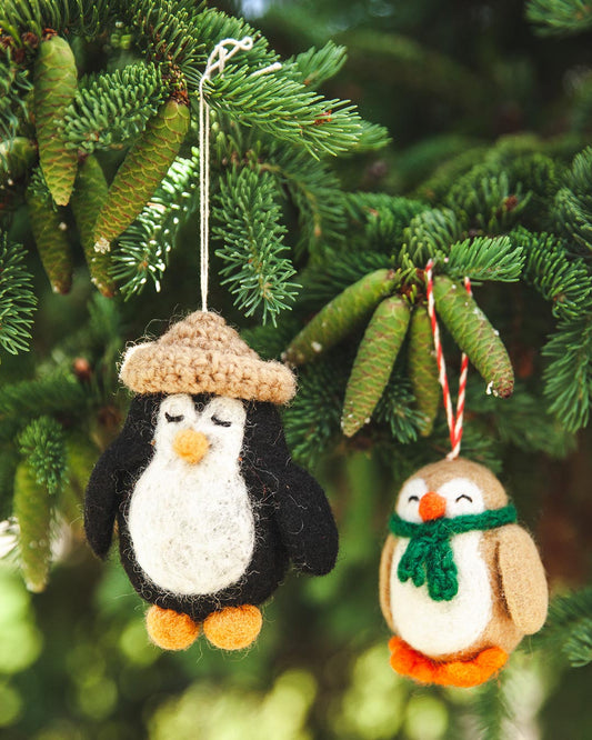 Farmhouse Pottery felted festive penguin ornaments.