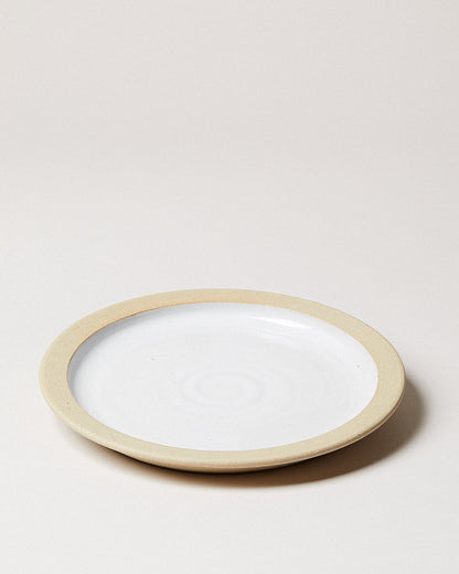 Farmhouse Pottery dinnerware plate on a white background.