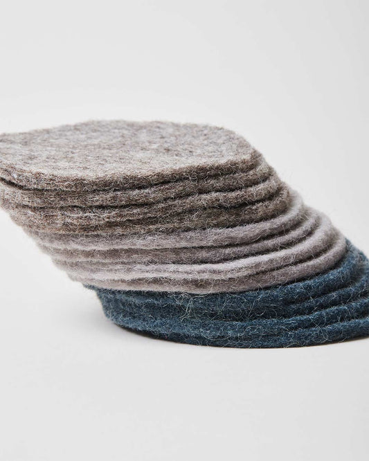 Farmhouse Pottery artisan felt coasters all three colors. 