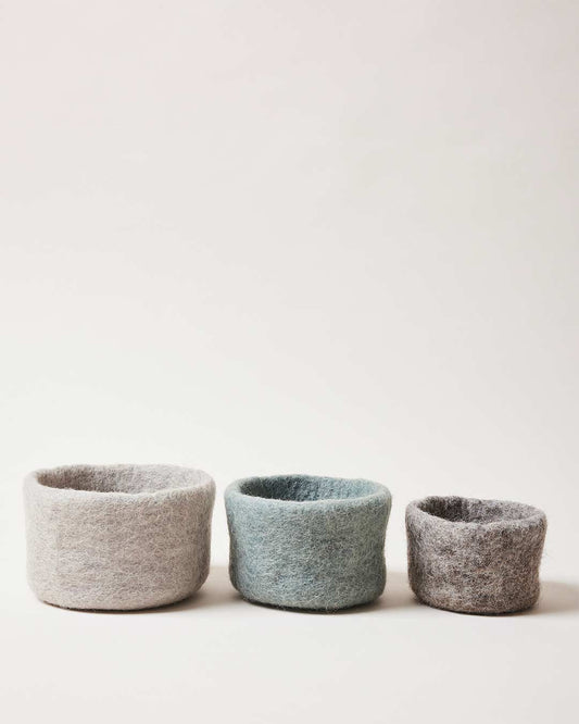 Farmhouse Pottery artisan felt nesting bowls various sizes and colors. 