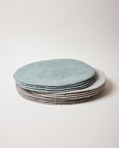 Farmhouse Pottery artisan felt placemats teal, pebble grey, stone. 