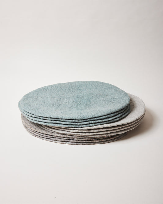 Farmhouse Pottery artisan felt placemats teal, pebble grey, stone. 