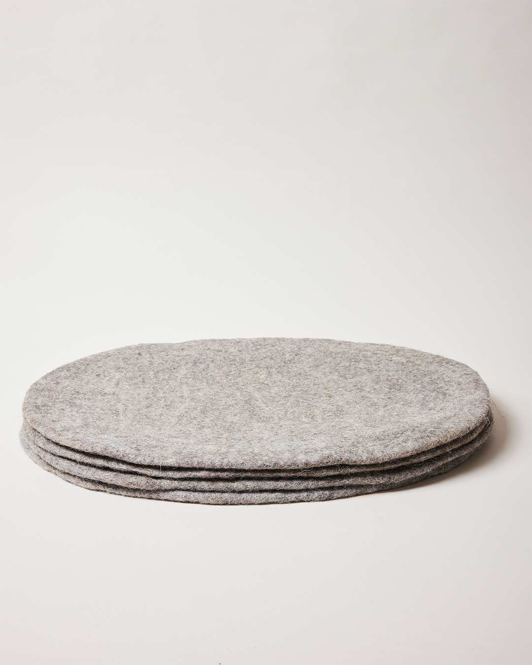 Farmhouse Pottery artisan felt placemats pebble grey. 