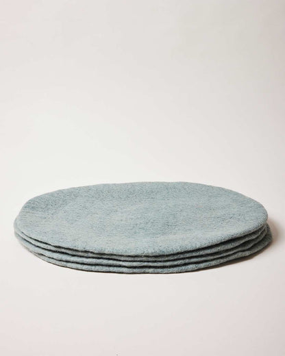 Farmhouse Pottery artisan felt placemats teal. 