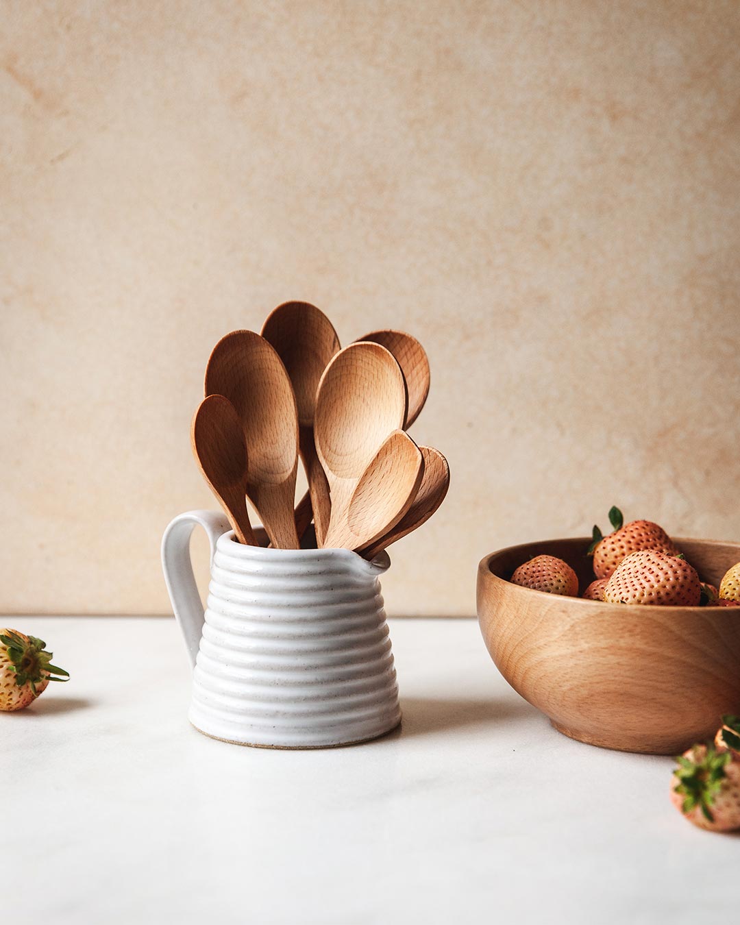 Farmhouse pottery essential kitchen little spoon set of 7 in beech shown in pitcher. 