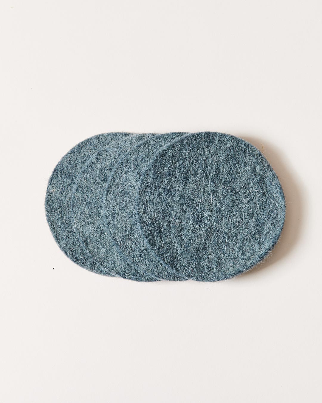 Farmhouse Pottery felt coaster in teal