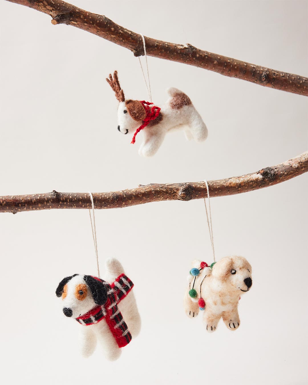 Farmhouse Pottery felted festive pup ornaments pack of pups. 