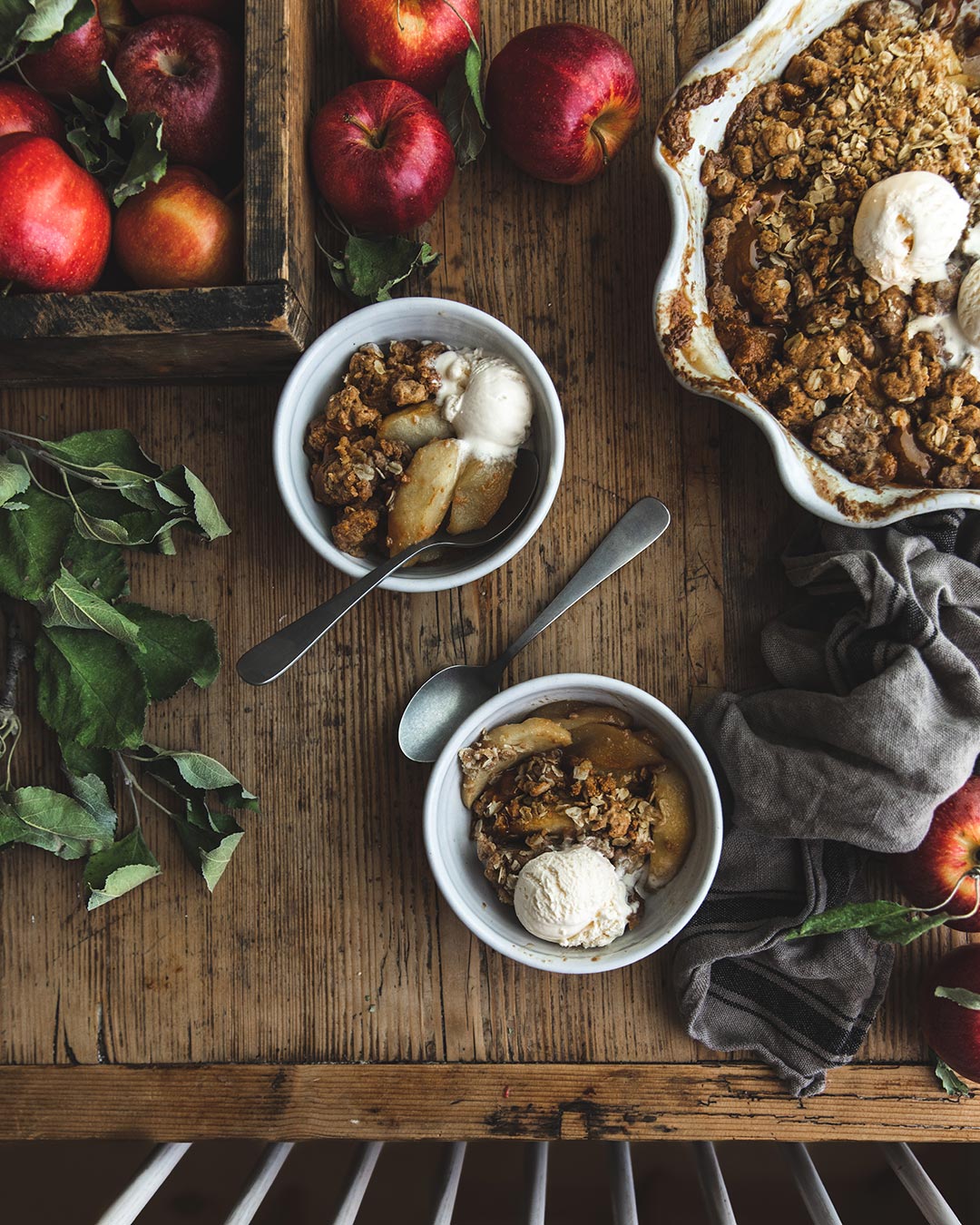 Farmhouse Pottery silo bowl with apple crisp and ice cream. 